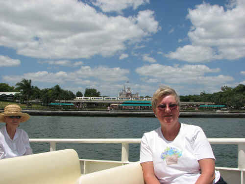 Heading back to Fort Wilderness with the Train Station and Cinderella Castle in the background.