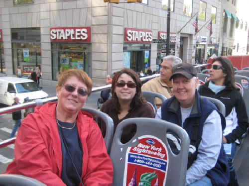 On the double-decker bus.