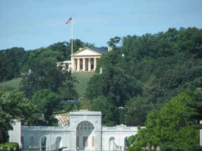 Entrance to Arlington National Cemetery with Robert E. Lee home in the background